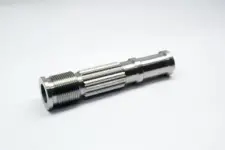A precision machined splined metal shaft for the tooling industry.