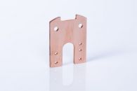 Fineblanked Aerospace component with holes in it