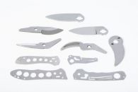 Multiple knife components made via fineblanking and grinding