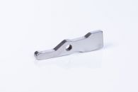 Hydraulic valve switch made via fineblanking