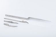 Fineblanked, machined and ground medical components