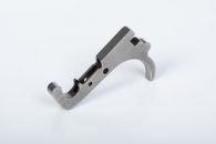 Trigger made via fineblanking, DDG, and CNC milling