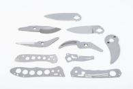 Multiple knife components made via fineblanking and grinding