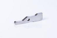 Hydraulic valve switch made via fineblanking